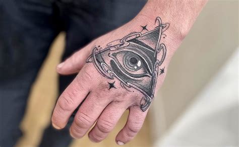 all seeing eye tattoo on hand|pyramid with eye tattoo meaning.